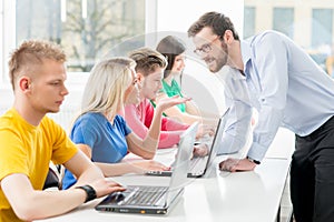 Students at the informatics and programming lesson photo