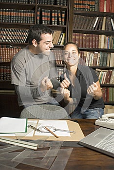 Students Joking in Library photo