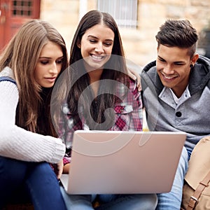 Students, laptop and research on campus for group project, diversity and online education in college. Learning, studying