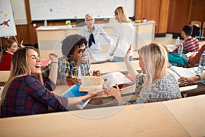 Students laughing while having lecture