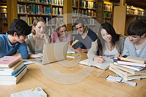 Students learning in a library