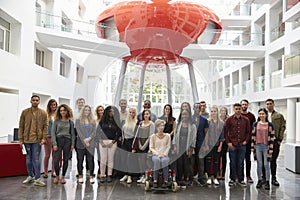 Students in modern university building, large group portrait