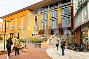 Students at North Carolina State University Walk toward the Talley Student Union.