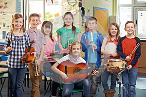 Students Playing In School Orchestra Together photo