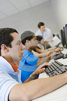 Students With Professor In Computer Lab