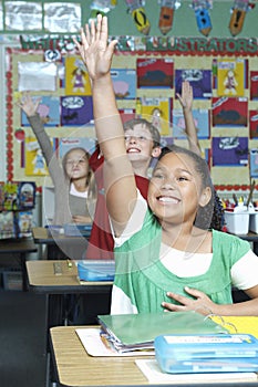 Students Raising Hands To Answer