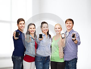 Students showing blank smartphones screens