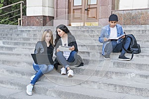 Students sitting on the stairs