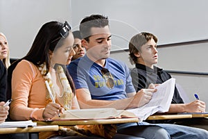 Students Studying In Classroom