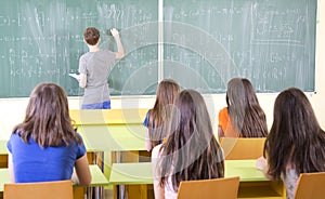 Students Studying In Classroom