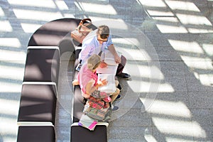 Students studying while sitting on chair at university