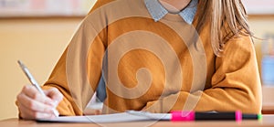 Students taking exam in classroom. Education test, exams concept. Web banner.