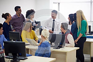 Students with teacher in computer lab classrom