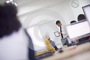 Students with teacher in computer lab classrom