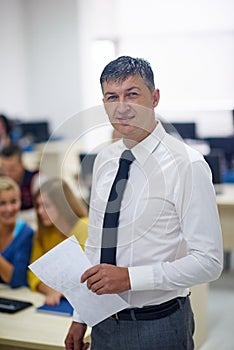 Students with teacher in computer lab classrom