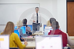 Students with teacher in computer lab classrom