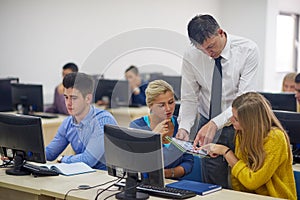 Students with teacher in computer lab classrom