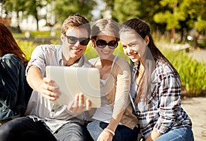 Students or teenagers with laptop computers