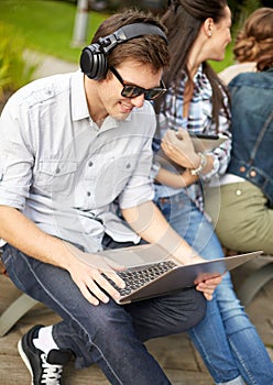 Students or teenagers with laptop computers