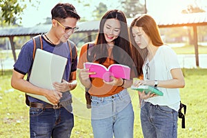 Students university asian together reading book