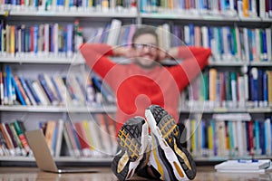 the students uses a notebook, laptop and a school library