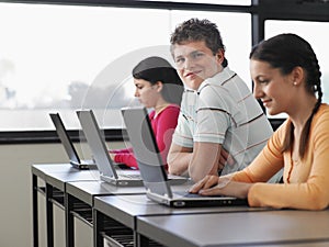 Students Using Laptops In Computer Class