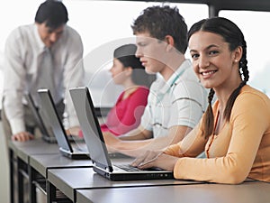 Students Using Laptops In Computer Class