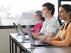 Students Using Laptops In Computer Class