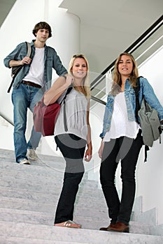 Students walking down stairs