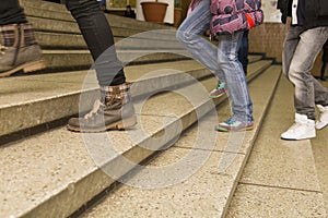 Students walking on stairs to there classes