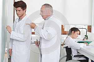 students in white coats