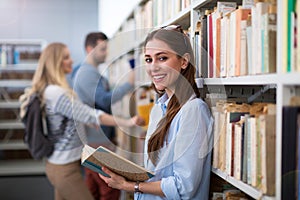 Students working in the library at campus