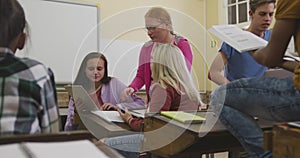 Students working together in high school class