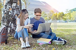 Students young asian together using laptop computer