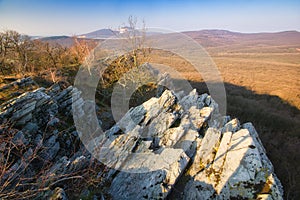 Studeny hrad rock at Tribec mountains during early spring sunrise