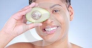 Studio, avocado and black woman with smile, portrait and fruit for moisturising, hydrate and health of skin. Purple photo