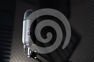 Studio condenser microphone in a recording studio