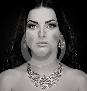 Studio, face, necklace and earrings, black and white