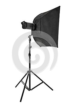Studio flash with softbox and stand on white