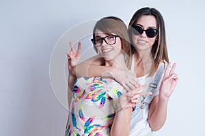 Studio lifestyle portrait of two best friends