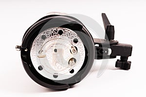 Studio light flash lamp closeup on white background isolated