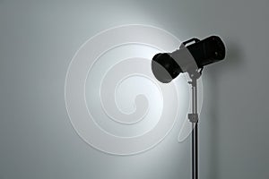 Studio lighting against white background.