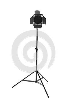 Studio lighting on a tripod stand, isolated on a white background. Searchlight for cinema. Making movie single icon in bitmap.