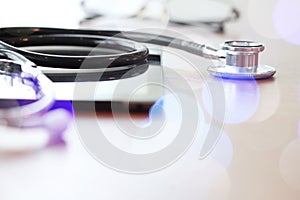 Studio macro of a stethoscope and digital tablet