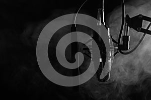 Studio Microphone isolated on a white background. Smoke banner