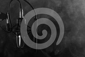 Studio Microphone isolated on a white background. Smoke banner
