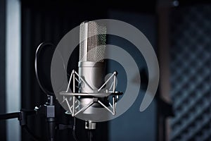 Studio microphone and pop shield on mic in the empty recording studio with copy space