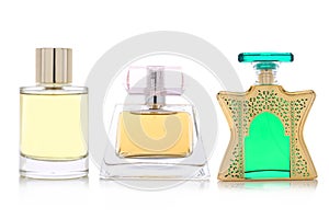 Studio photo of set of luxury perfume bottles. Isolated on white background