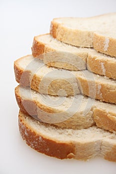 A studio photograph of 5 slices of white bread photo