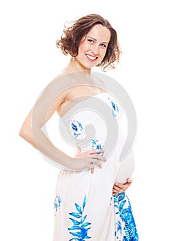 Studio picture of smiley pregnant woman